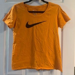 Orange and black large kids Nike shirt